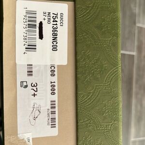 New worn once Gucci patent leather flat sling back pumps.  With box